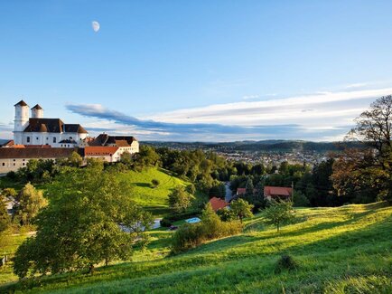 Panoramic view of Weiz and basilica in Eastern Styria