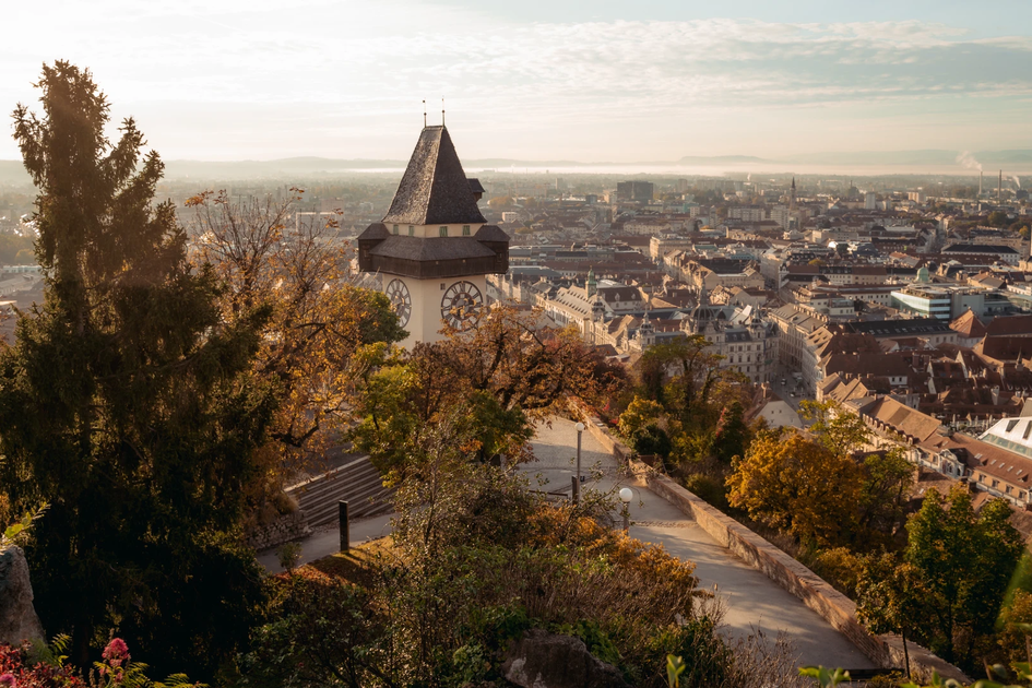 Autumn view from Schlossberg Graz with Clock Tower | © Graz Region | studio draussen