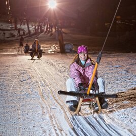 Winterrodeln auf der Grafenwiese | © Mirja Geh