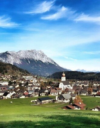 Ortsansicht Gröbming mit Bergpanorama | Schladming Dachstein - TVB Gröbminger Land | © Erlebnisregion Schladming-Dachstein