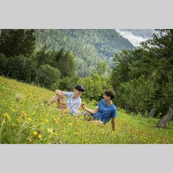 Break in a flower meadow | © Steiermark Tourismus | Jesse Streibl