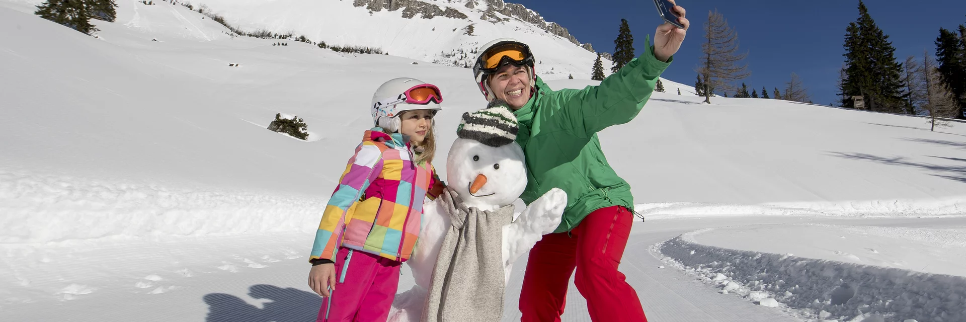 Selfie mit Schneemann auf der Brunnalm | © STG | Tom Lamm