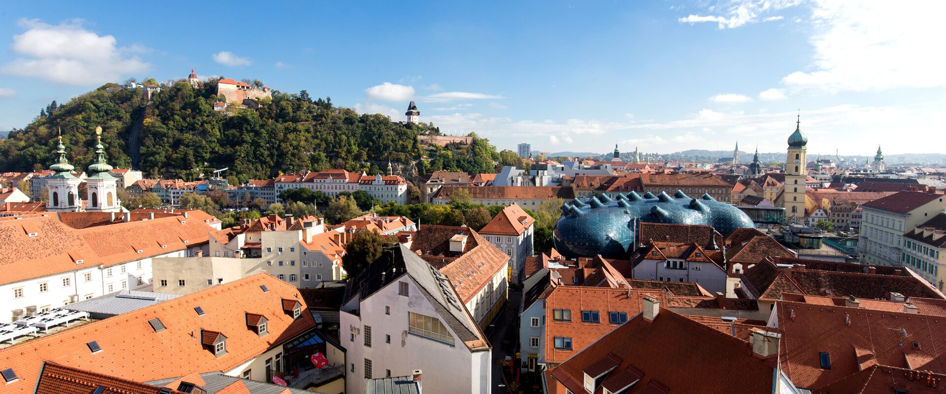 Dächerlandschaft von Graz mit Schlossberg | © STG | Harry Schiffer