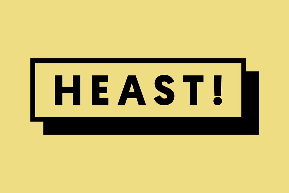 Ein gelbes Hintergrunddesign mit dem Schriftzug „HEAST!“ in schwarzer Schrift. Der Text ist modern und auffällig gestaltet.