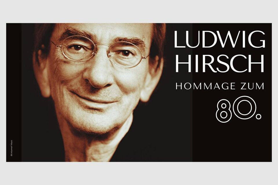 Ein Porträt von Ludwig Hirsch, der lächelnd in die Kamera schaut. Der Hintergrund ist in dunklen Tönen gehalten und es gibt einen Schriftzug zur Ehrung seines 80. Geburtstags. | © Universal Music