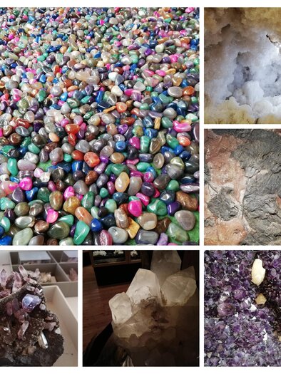 Bunte Mineralien und Kristalle in verschiedenen Formen und Farben. Die Oberfläche ist vielfältig und glitzernd.