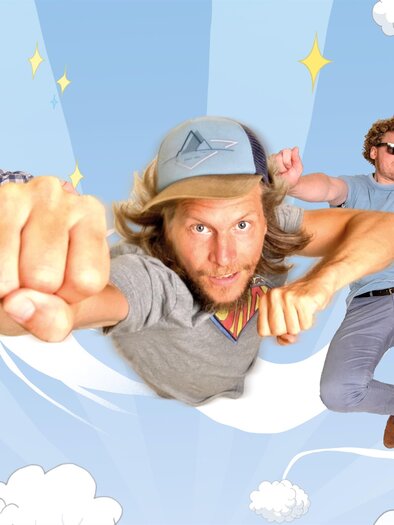 <p>Three flying musicians against a broadly striped light blue background! The right musician in the background holds a guitar, the middle one strikes a flying pose with a clenched fist, and the left musician in the background holds two drumsticks.</p> | © mexer