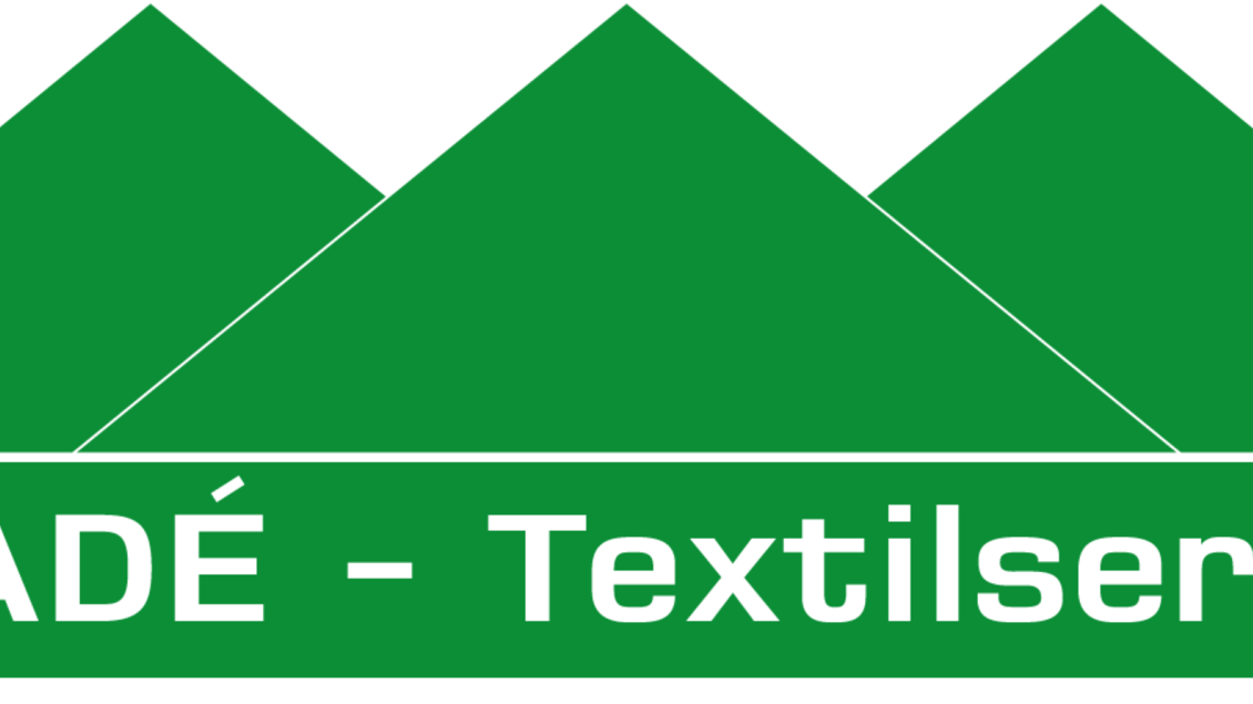 Ein Logo mit drei grünen Bergen und dem Schriftzug "AMADÉ - Textilservice". Das Design ist einfach und prägnant. | © Textilservice