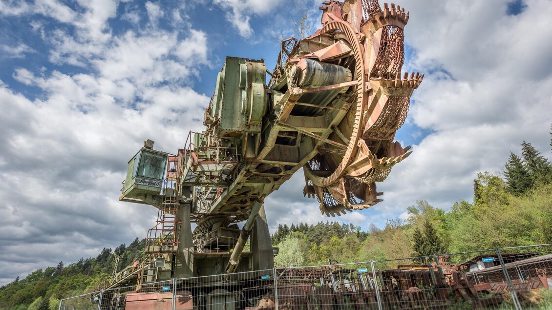 Schaufelradbagger Leopold mit großem Schaufelrad im Energie Erlebnispark Zangtal in Voitsberg | © TV Region Graz - Die Abbilderei