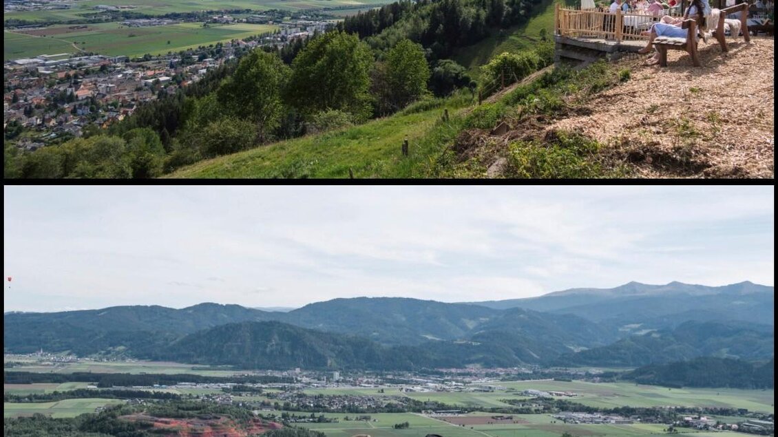 Eine atemberaubende Aussicht auf grüne Hügel und ein Tal mit Häusern. Ein Paar sitzt auf einer Bank und genießt die Landschaft. | © Jausenstation Höhn