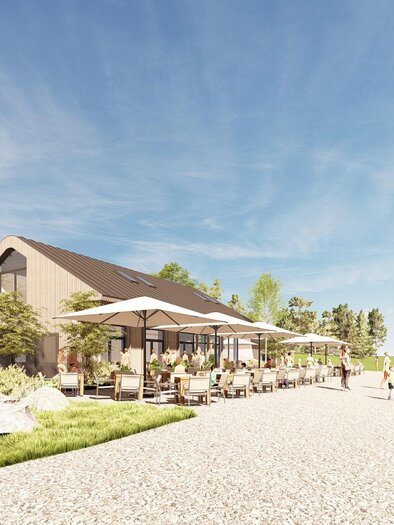 A modern beach house with terraces and sun umbrellas. The beach is inviting and the surroundings are green with some trees. | © Renering_Thorhof