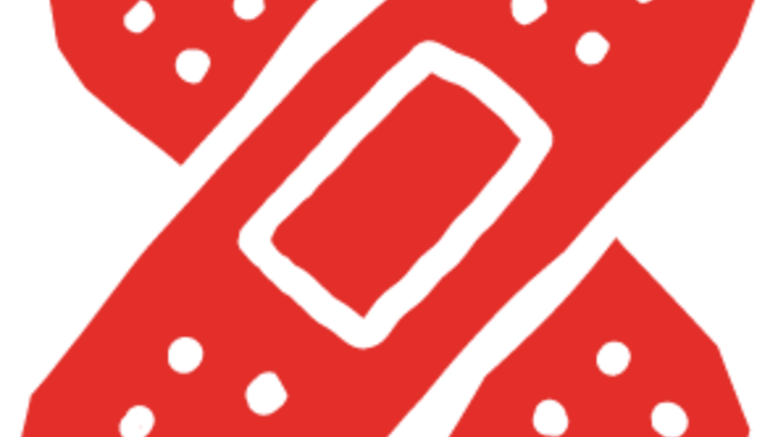 Ein rotes Pflaster in Form eines Kreuzes auf schwarzem Hintergrund. Es symbolisiert Gesundheit und Wundversorgung. | © TV-Gesäuse