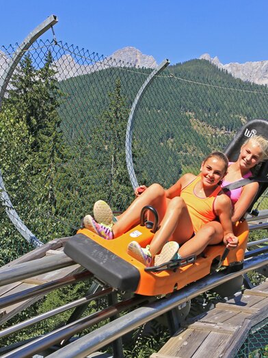 Zwei Kinder am Rittisberg Coaster. | Photo-Austria | © Erlebnis Rittisberg