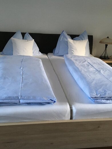 Dreibett-/Vierbettzimmer