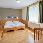 Photo of Shared room, bath, toilet, 2 bed rooms | © JUFA Hotel Bad Aussee