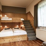 Photo of 4-bed room | © JUFA Hotel Lipizzanerheimat