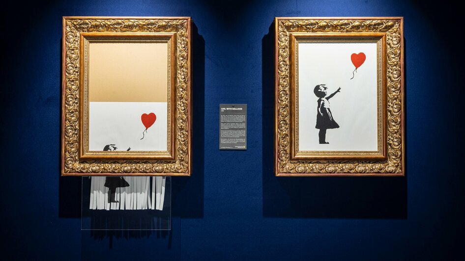 Ausstellung von Bildern mit Kindern von Banksy | © Dominik Gruss